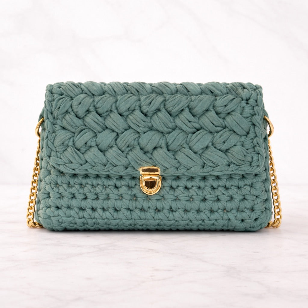 Icon 02 — Bolso texturizado con cadena