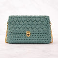 Icon 02 — Bolso texturizado con cadena